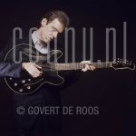 John Hiatt (Date Unknown) at studio in Amsterdam.

[keywords]Posed, Half Length, Eyecontact, Guitar[/keywords]